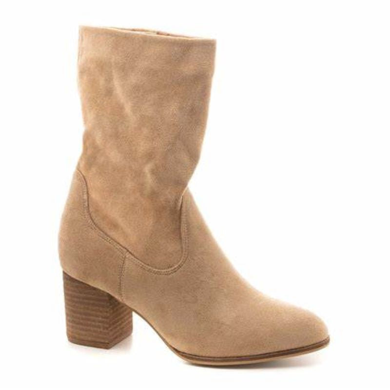 A CORKY'S FOOTWEAR INC women's beige ankle boot with a wooden heel, featuring soft and squishy insoles called CORKYS WICKED SAND.
